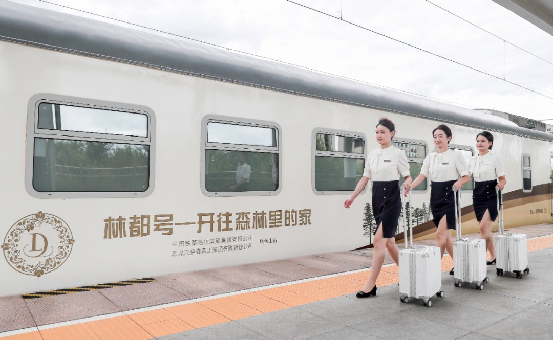 The Lindou Express waiting at a snow-covered platform in north-east China